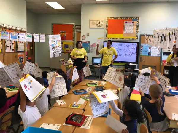 EY volunteers in an elementary classroom